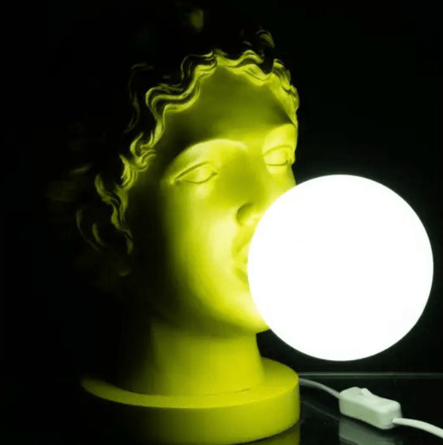 LAMPE FEMME TETE RESINE JAUNE